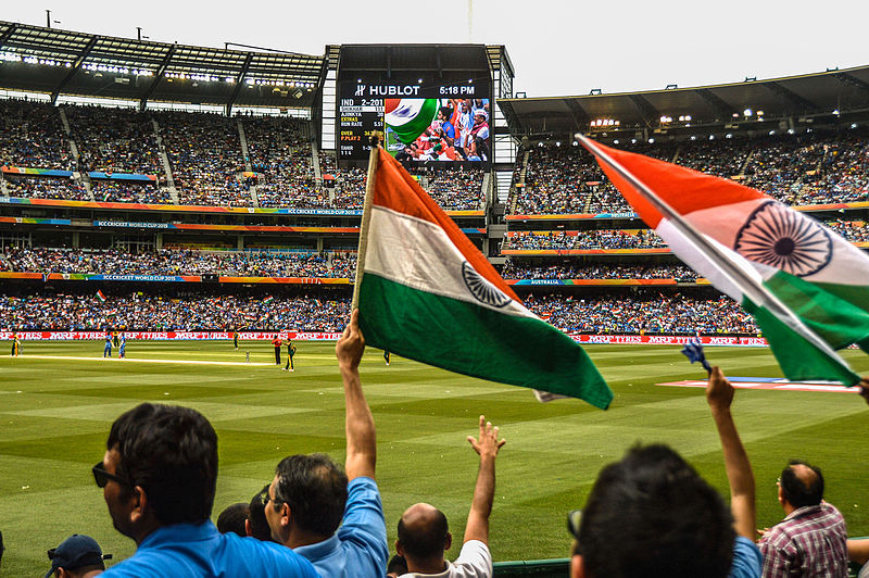 Indian Cricket, Photo by Rajiv Bhuttan, Indian Cricket supporters at the Melbourne Cricket Ground (MCG) during the 2015 Cricket World Cup, CC BY 2.0