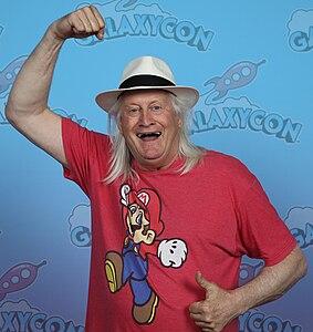 Super Festivals from Ft. Lauderdale, USA, Charles Martinet Photo Op GalaxyCon Raleigh 2023 (cropped), CC BY 2.0